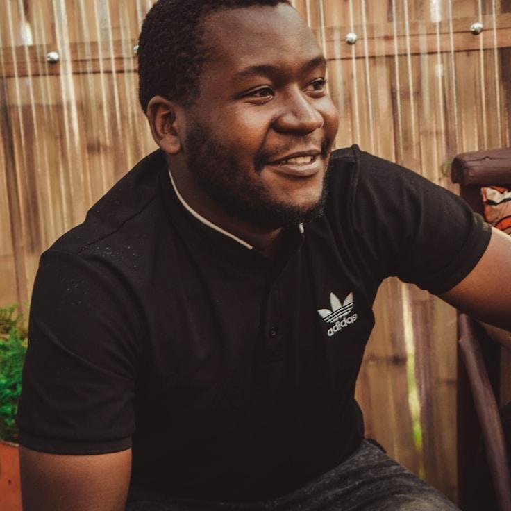 Alex Rivera, Lead Design Curator at PulpPressProse, reviewing corporate floral arrangements